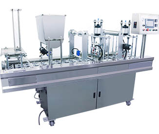 Continuous heat sealer for cups